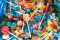 Close-up of a colorful assortment of lollipops and candies.