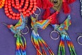 Close up of colorful beaded hummingbirds or colibrisold at the Otavalo market, Ecuador, beadworks, beadwork