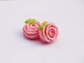 Close up of colorful candy with rose shaped. `A-lua or Allure` Thai handmade candy