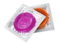 Close up of colorful condoms over white background Royalty Free Stock Photo