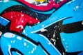 Close up of colorful damaged urban wall texture