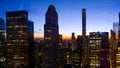 CLOSE UP: Colorful dusk illuminates tall skyscrapers in downtown Manhattan. Royalty Free Stock Photo