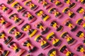 Close up of colorful farfalle. Also known as bowtie or butterfly pasta. Colorful farfalle pasta in a pattern on pink. Also known Royalty Free Stock Photo