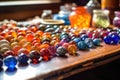 close-up of colorful glass beads on a workbench Royalty Free Stock Photo