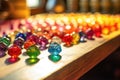 close-up of colorful glass beads on a workbench Royalty Free Stock Photo