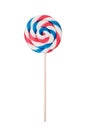 Close-up of colorful, hand-made swirl spiral lollipop isolated on white background. Studio shot Royalty Free Stock Photo