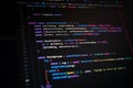 Close-up of colorful JavaScript code on dark screen showing two-factor authentication logic, used in web development, programming Royalty Free Stock Photo