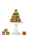 Close up on colorful licorice candy squares on pedestal isolated Royalty Free Stock Photo