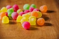 Close up colorful liquor sweets on wooden table