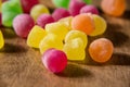 Close up colorful liquor sweets on wooden table