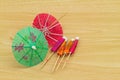Close up colorful of many cocktail umbrellas on white wooden Royalty Free Stock Photo