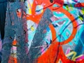 close up of colorful messy painted urban wall texture