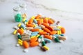 Close up of colorful pile of medicine pills on white background. Healthcare, overdose or treatment concept