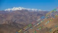 CLOSE UP: Colorful prayer flags flutter in the desert leading to Mount Everest Royalty Free Stock Photo