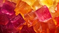 Close-up of colorful red, orange, and yellow jello cubes. Royalty Free Stock Photo