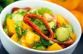 Close Up of colorful salad from tomatoes, cucumbers, peppers and Royalty Free Stock Photo