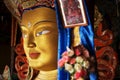 Close up colorful sculpture of Maitreya buddha