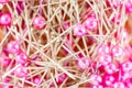 Close up colorful sewing pins pile and reflection. Royalty Free Stock Photo