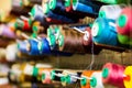 Close Up Of Colorful Sewing Threads In Drawer. Closeup Shot Of Multicolored Spools Of Thread, Sewing Accessories In Royalty Free Stock Photo