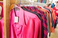 Close up colorful shirts made from silk on Hanging Rail Royalty Free Stock Photo