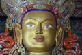 Colorful statue of Maitreya Buddha at Tibetan Buddhist Thiksey Monastery near mountain village Leh in ladakh region, north India Royalty Free Stock Photo