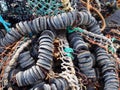 close up of colorful tangled old fishing net rope and floats