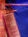 Close up of Colorful traditional Sari, saree displayed in India. natural silk, cotton fold fabric texture. Indian Handloom cotton Royalty Free Stock Photo