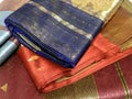 Close up of Colorful traditional Sari, saree displayed in India. natural silk, cotton fold fabric texture. Indian Handloom cotton Royalty Free Stock Photo