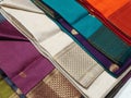 Close up of Colorful traditional Sari, saree displayed in India. natural silk, cotton fold fabric texture. Indian Handloom cotton Royalty Free Stock Photo