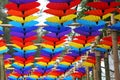 Colorful umbrellas hanging on bamboo wood at Chiang Mai Flower Festival Royalty Free Stock Photo