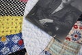 Close Up of Colorful Vintage Quilt with Antique Photo of Hands t