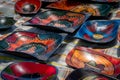 Colorful painted wooden bowls in market