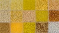 Close up of colorful yellow seed beads in square sections flat lay background Royalty Free Stock Photo