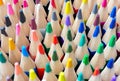 Close-up of coloured pencil tips standing upright. Art supplies. Royalty Free Stock Photo