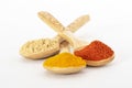 Coloured spices on white background Royalty Free Stock Photo