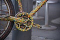 A close up colourful bicycle front derailleur in dots colour painted.