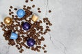 Close up colourful coffee capsules with some roasted grains on concrete Royalty Free Stock Photo