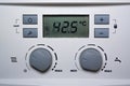 Close-up of a combi gas boiler control panel.