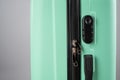 Close-up of a combination lock of a mint plastic suitcase. Royalty Free Stock Photo