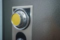 Close up of combination safe with yellow knob Royalty Free Stock Photo