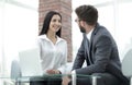 Close-up of company employees communicating in the office Royalty Free Stock Photo