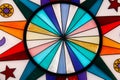 Close-up of a compass rose on a white background in a circular shape and colorful design Royalty Free Stock Photo