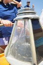 Close-up of compass on sailboat's helm