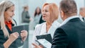 Close up . competent businesswoman talking to her colleague. Royalty Free Stock Photo