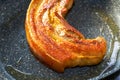 Close-up of a complete piece of delicious fried pork belly