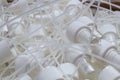 Close-up of component caps, lids, tubes for aerosol cans and sprayers of chemicals and perfumes. Parts used in the aerosol Royalty Free Stock Photo