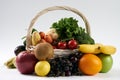 Close-up composition with vegetables and fruit in wicker basket Royalty Free Stock Photo