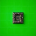 Close up of a computer chip on a vibrant green background Royalty Free Stock Photo