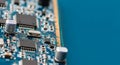Close Up of Computer Circuit Board with Electronic Components on Blue Background Royalty Free Stock Photo