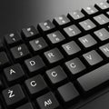 A close up of a black computer keyboard with white lettering Royalty Free Stock Photo